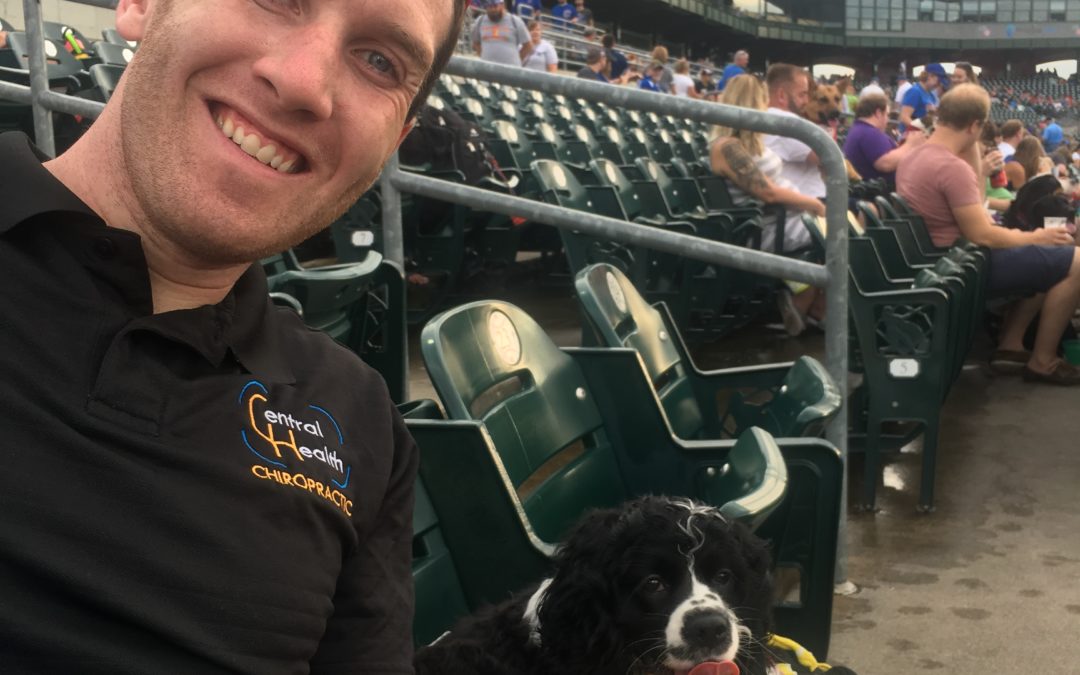 Downtown Des Moines Chiropractor, Dr. Jake and his dog, Paisley, visit the Iowa Cubs